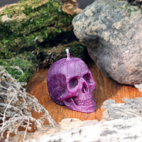 Свеча восковая череп фиолетовая малая